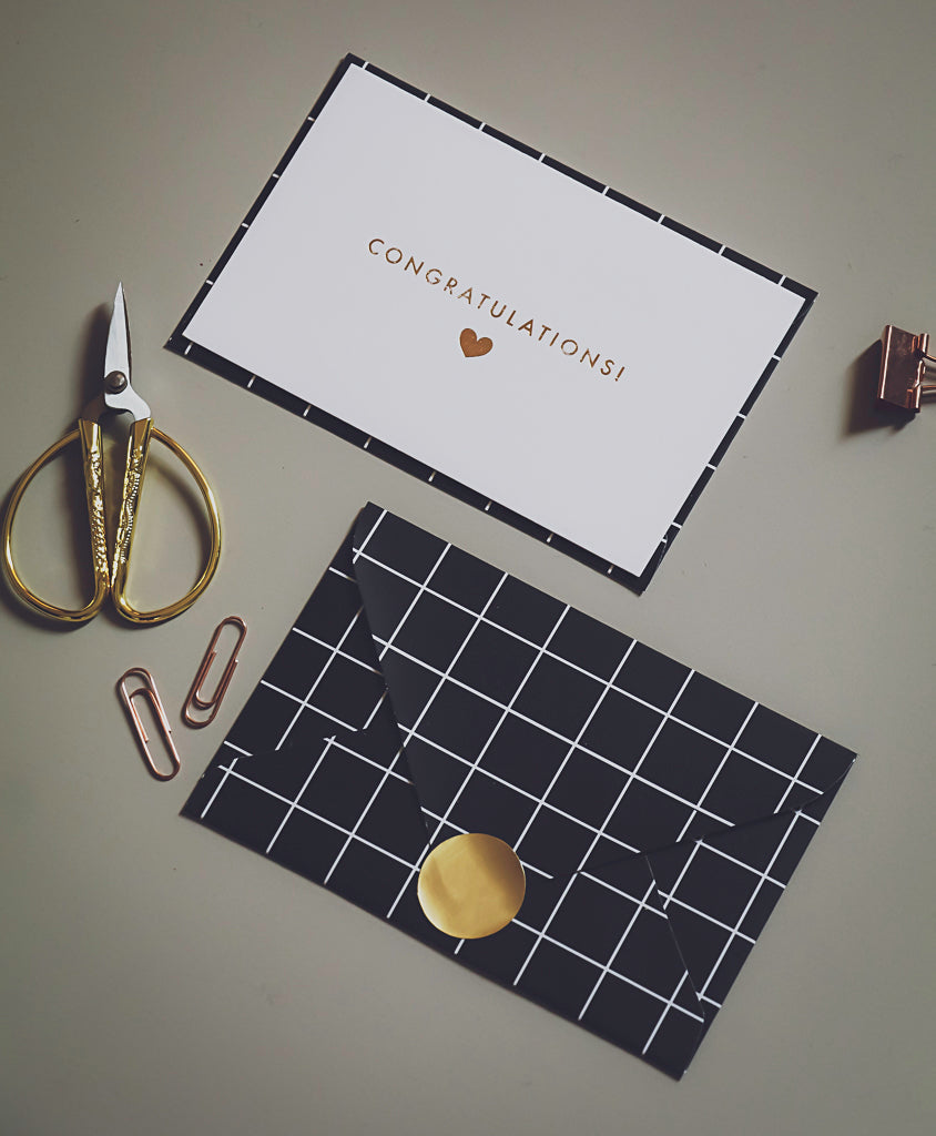Congratulations notecard with black and white checkered envelope