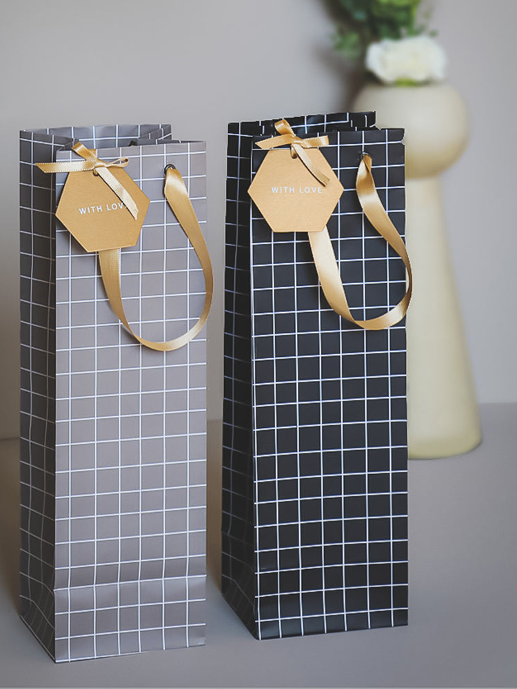 Tall wine gift bag with rope handles and kraft paper gift tag