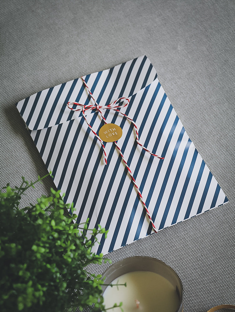 Navy blue candy stripe gift pouch with gold sealing sticker, pack of 10